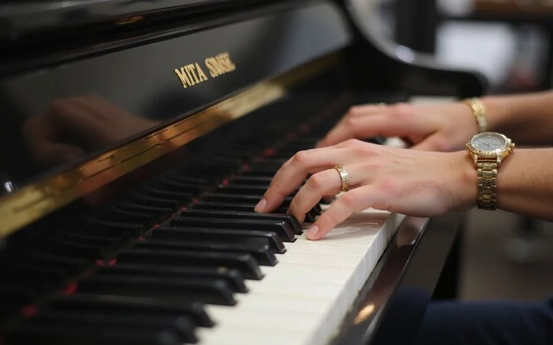 Detail shot of piano keys or action illustrating How Much Does a Used Piano Cost in Yorkshire?, documentary style, natural light